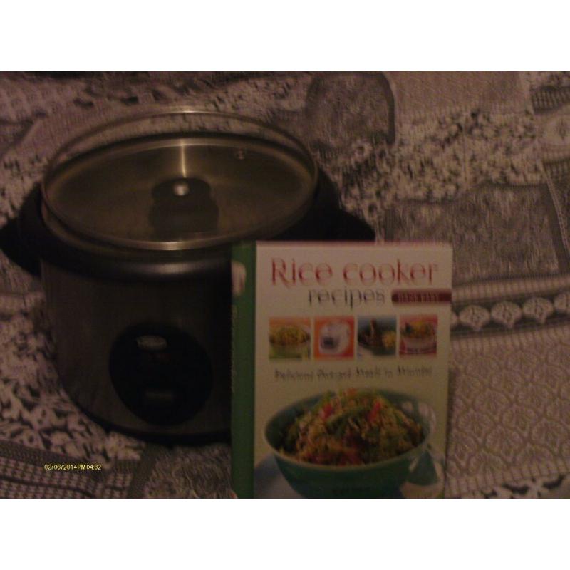 Used electric rice cooker with recipe book