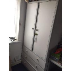 Wardrobe and desk and bed